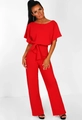 Detailed view of red wide-leg jumpsuit featuring waist tie belt and batwing short sleeves - S / Red