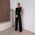 Chic black sleeveless jumpsuit with padded shoulders and wide-leg cut for women - S / Black