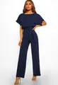 Detail of navy blue short sleeve jumpsuit showing waist tie bow and fabric texture - Navy Blue