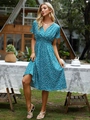 Close-up of lightweight floral summer dress featuring V-neck and elastic high waist - S / Dark Green