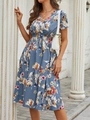 Detail of the V-neck design and floral print on a summer A-line dress for women - S / Blue Gray