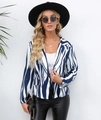 Detailed view of blue and white striped blazer with double-breasted buttons and lapels - S / Blue Zebra (101738)