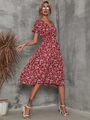 Detail of red floral midi dress with V-neckline and elastic waist in a garden style - S / Red