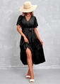 Detail of black V-neck wrap dress featuring tiered ruffle skirt and elegant waist tie - Black