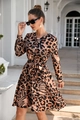 Detailed view of leopard print long-sleeve dress with waist belt and button closure - Orange Leopard