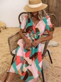 Close-up of bohemian floral print dress with V-neck and elastic waist detail - S / Green