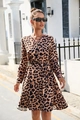 Detail of leopard print long sleeve dress with V-neckline, front buttons and waist tie - Classic Leopard