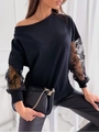 Detail eines eleganten schwarzen Langarm-Tops mit Spitze und schulterfreiem Design - S / Schwarz