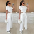 Women's white casual two-piece set featuring drawstring cropped top and high-waisted pants - S / White