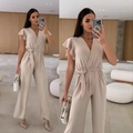 Elegant beige V-neck jumpsuit with ruffle sleeves and waist tie for a stylish summer look - S / Khaki