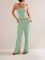Detail of green striped two-piece set with tube top and high waist wide leg pants - S / Green Zirconia Set
