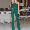 Detail of dark green one-shoulder jumpsuit with slit sleeve and matching fabric belt - S / Green