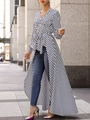 Detail view of V-neck striped tunic with high-low hem and waist tie on street model - S / Black and Gray