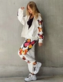 Detail of colorful butterfly prints on white zip-up hoodie and jogger pants set - S / Top And Bottom / White