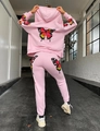 Pink tracksuit with colorful butterfly print featuring a zip hoodie and jogger pants - S / Top And Bottom / Pink