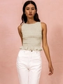 Detail view of beige smocked sleeveless top with peplum hem and elastic pleated texture - S / Apricot