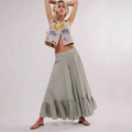 Detailed view of women's boho embroidery vest and wide-leg trousers with ruffled hem - S / Light Green
