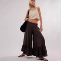 Detail of low-waisted flared trousers with ruffled hem and linen buttoned vest - S / Black