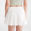 Mini-jupe blanche à plusieurs épaisseurs avec bordures en dentelle et taille élastique - S / Blanc