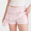 Jupe-short rose à volants avec détails en dentelle et taille à cordon pour l'été - S / Rose Clair