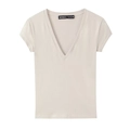 T-shirt slim da donna con scollo a V e maniche corte in una tonalità beige chiaro - S / Albicocca