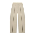 Détail d'un pantalon large kaki avec taille plissée profonde et silhouette ballon chic - XS / Blanc