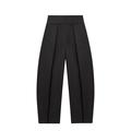 Détail du pantalon ballon noir à taille haute avec des plis profonds devant - XS / Noir