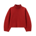 Detail of dark red bouclé sweater showing thick textured fabric and ribbed high collar - Red