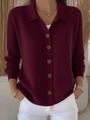 Close-up of wine red knit cardigan featuring polo collar and refined button details - Burgundy