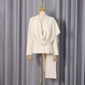 Detail of ivory blazer featuring draped collar with pearl and rhinestone pendants - S / Apricot
