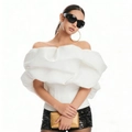 Detail of white off-shoulder corset top with pleated texture and black sequined shorts - White