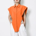 Detail of bright orange sleeveless shirt featuring a sharp asymmetric pointed hemline - S / Orange