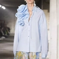Light blue long sleeve shirt featuring a 3D pleated ruffle flower on the shoulder - S / Blue