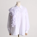 Detailed view of the large 3D pleated floral design on a white long-sleeved shirt - S / White