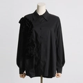 Detailed view of the 3D ruffle flower stitching on this black long sleeve designer shirt - S / Black