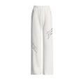 Dettaglio dei joggers bianchi a gamba larga con vita alta e tagli alla moda con borchie metalliche - L / Bianco