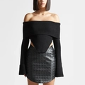 Slim fit black off-shoulder knitted top paired with a woven leather mini skirt - M / Black