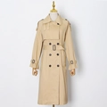 Detail of light khaki trench coat showing double-breasted buttons and waist belt - XS / Gold Brown
