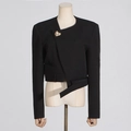 Short black asymmetrical suit jacket with golden shell button on a mannequin - XL / Black