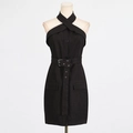 Detail of cross-halter neckline and waist belt on a black utility-style mini dress - S / Black