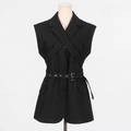 Detail view of sleeveless black blazer vest featuring cross-strap design and eyelet belt - S / Black