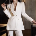 Detailed embroidery of a golden feather on a white tailored women's blazer - M / Tops / White