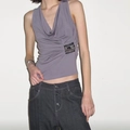 Detail view of purple sleeveless top featuring pleated V-neck and black sequin side accents - S / Gray