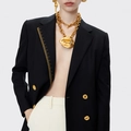 Detail eines schwarzen zweireihigen Blazers mit goldener Linealstickerei und Lippenkette - S / Schwarz