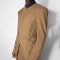 Detail of metal eyelets and side lace-up design on brown designer blazer jacket - S / Brownish Yellow