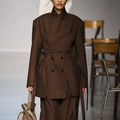 Detailed view of dark brown deconstructed blazer with layered design and waist belt - S / Tan