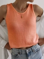 Détail d'un gilet sans manches en maille orange vif avec texture ajourée délicate - S / Rouge Orangé