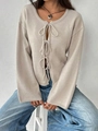 Minimalist beige knitted cardigan featuring front tie closures and a cozy long sleeve design - L / Khaki