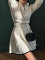 White cable knit two-piece set featuring a buttoned sweater and pleated mini skirt - S / Off White