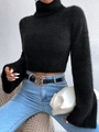 Detailaufnahme des schwarzen Cropped-Rollkragenpullovers mit weicher Mohair-Textur und Ärmeln - S / Schwarz